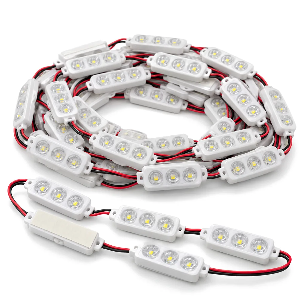 Coil of white 3-LED channel letter modules joined by red and black wire, a few laid flat in front, on white