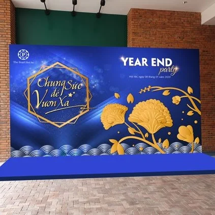 Vinyl banner backdrop for event with a blue and gold theme. Ideal for corporate celebrations and year-end events.